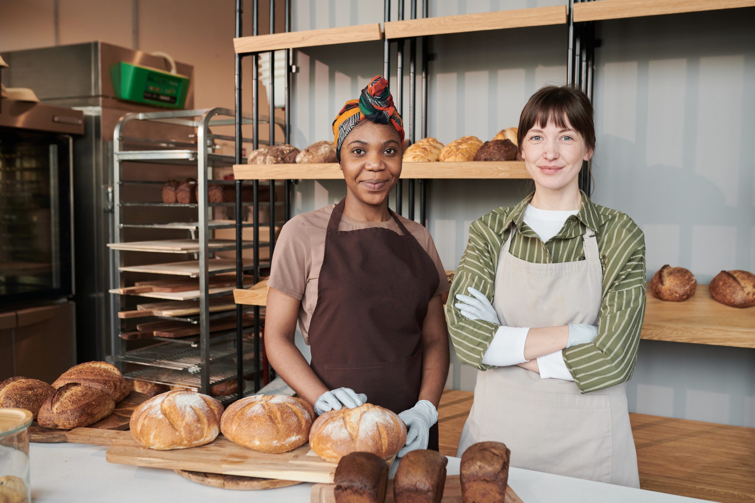 Two saleswomen in bakery shop